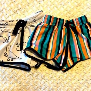 Cash and company swim trunks. 2T